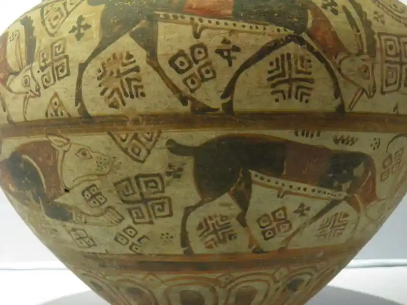 Different forms of crosses and animals painted on a vase, located at Archaeological Museum of Izmir, Turkey.